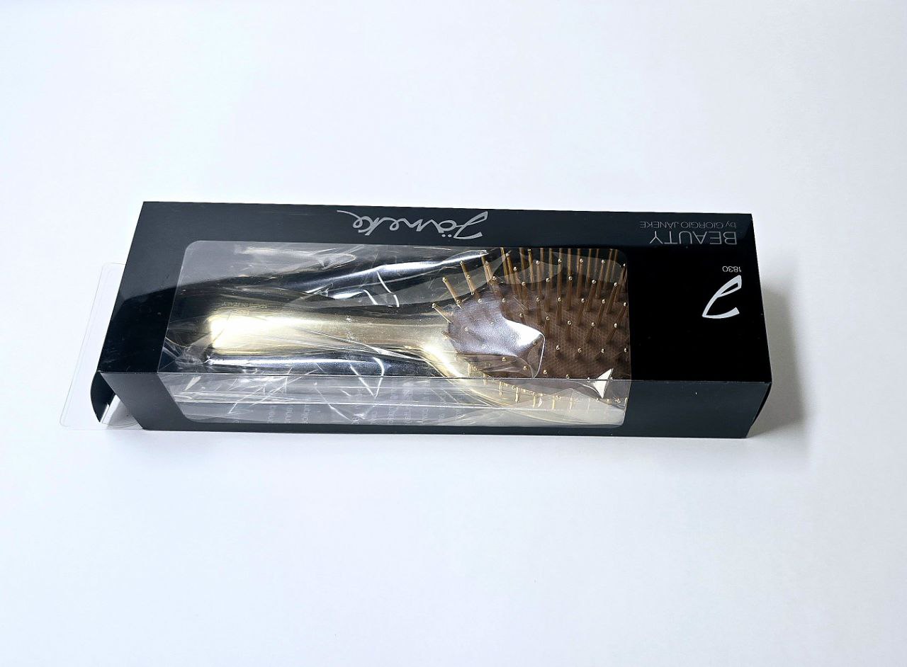Golden air-cushioned brush with gold pins